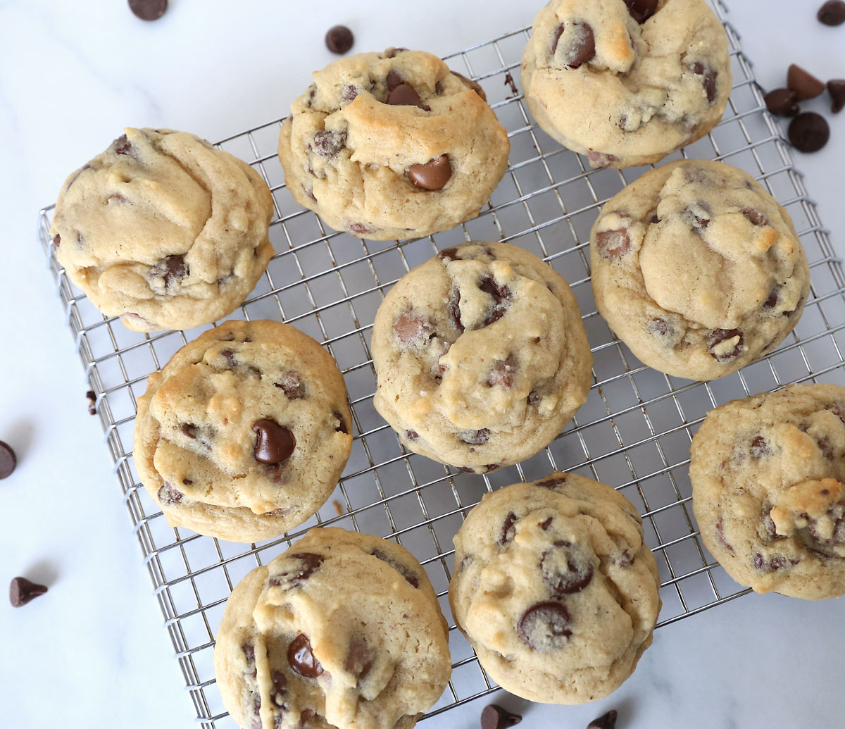Soft, delicious chocolate chip cookies on a cooking rack