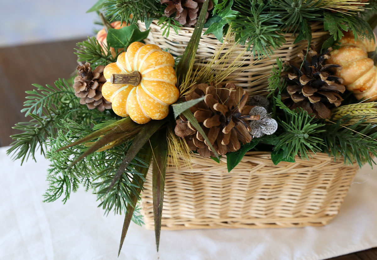 Fall accents on a DIY basket centerpiece