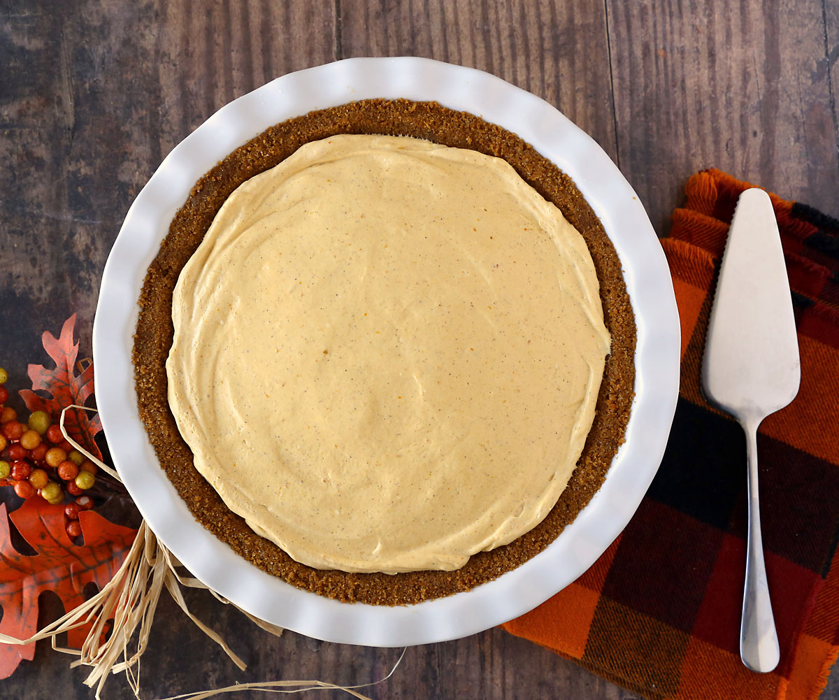 Simple no bake pumpkin cheesecake in a gingersnap crust