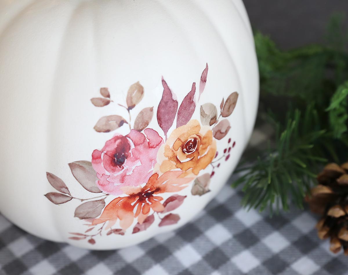 Close up of floral tattoo on a craft pumpkin