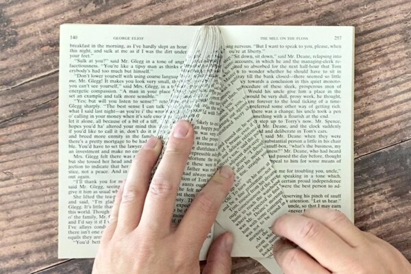 Hold folded pages to the left as you continue to fold pages on the right