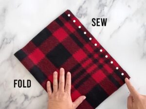 Fold fleece in half and sew