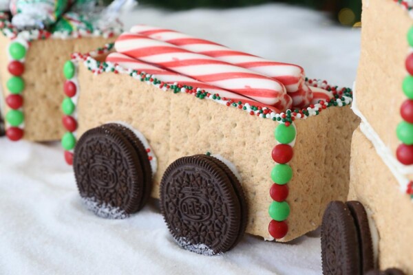 Graham cracker train car decorated with M&Ms and sprinkles