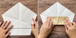 Hands folding bottom edge of paper pentagon up to meet folds