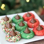 Plate of red and green Christmas cookies with Hershey kisses on top