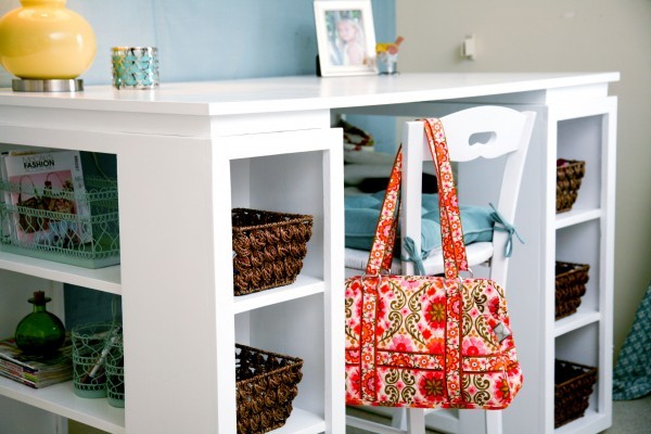 DIY craft desk with storage baskets underneath