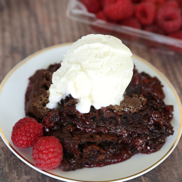 Chocolate raspberry cobbler with raspberries and vanilla ice cream