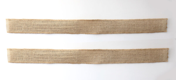 Two strips of burlap ribbon glued together with pipe cleaners in between them