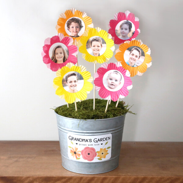 Flower pot with label: Grandma's garden, grown with love; with flowers made from photos and cupcake liners