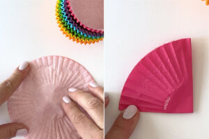 Hands folding colored cupcake liners into quarters