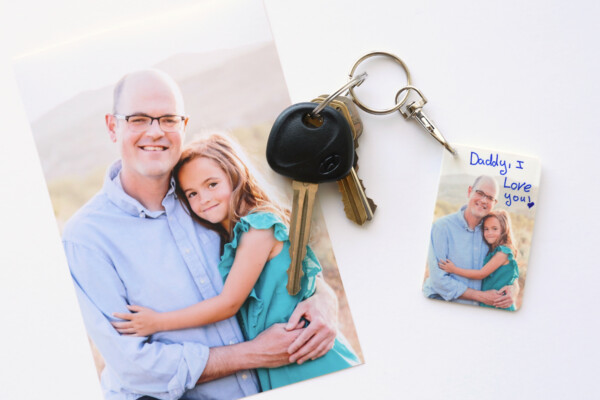 Photo of a girl and her dad; same photo on a DIY keychain