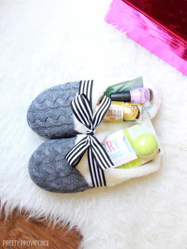 Slippers tie with a bow stuffed with gifts