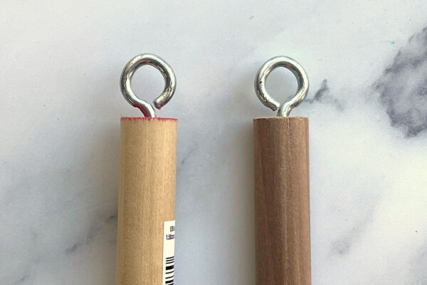 Eye hooks screwed into one end of each wood dowel