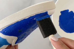 Painting the top of a canvas shoe blue