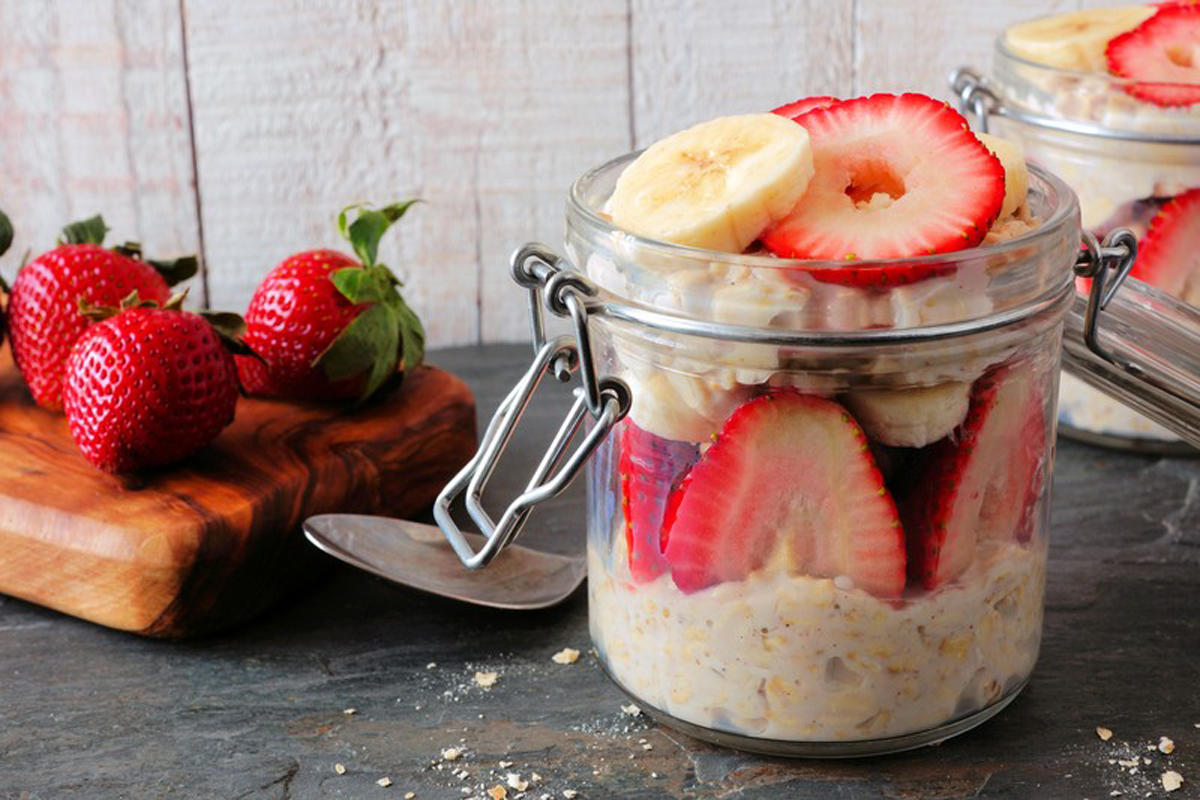 Overnight oats in a jar with banana and strawberry slices
