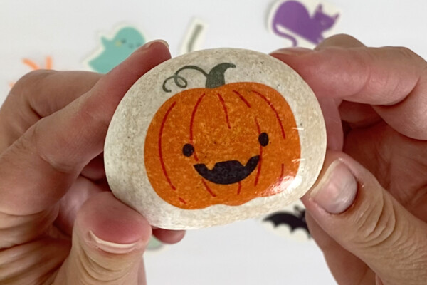 White rock with pumpkin transferred onto it