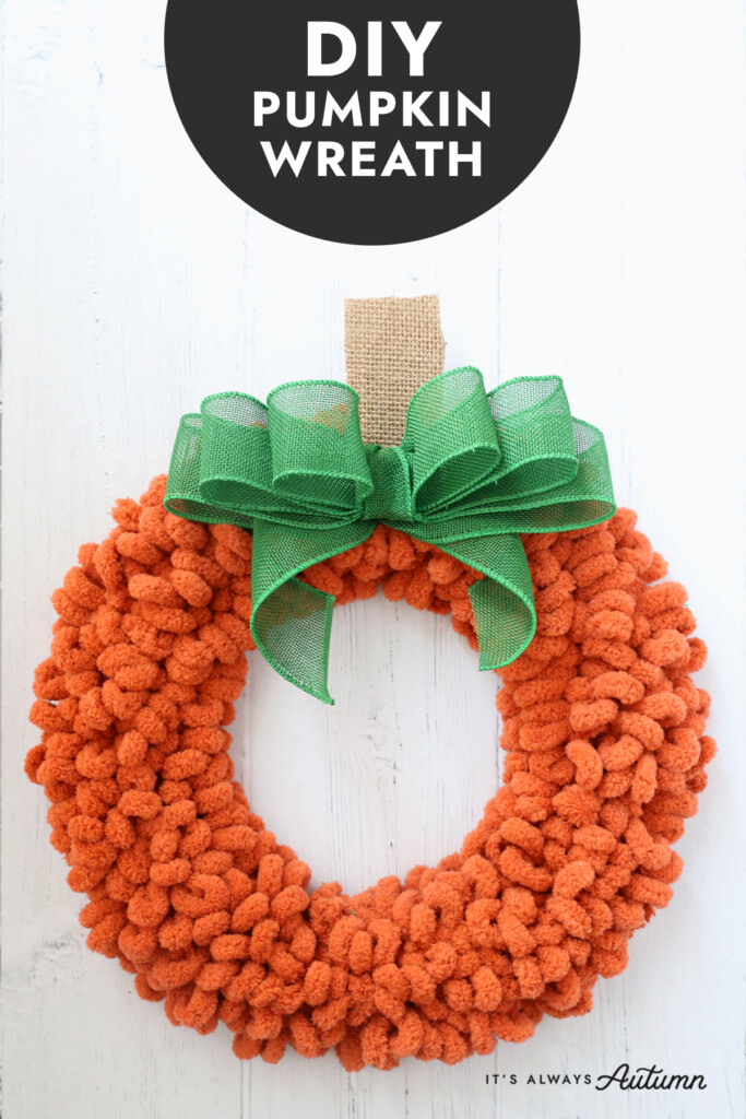 DIY pumpkin wreath made with orange loop yarn
