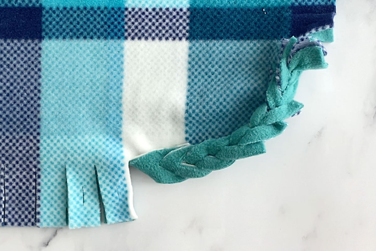 Pieces by Polly: Double Layered No-Sew Braided Fleece Blanket Tutorial