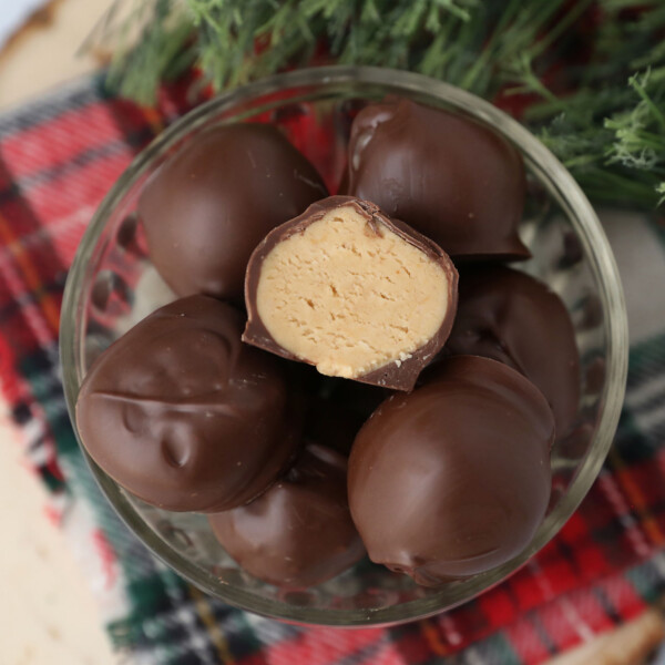 peanut butter balls candy in a glass candy dish