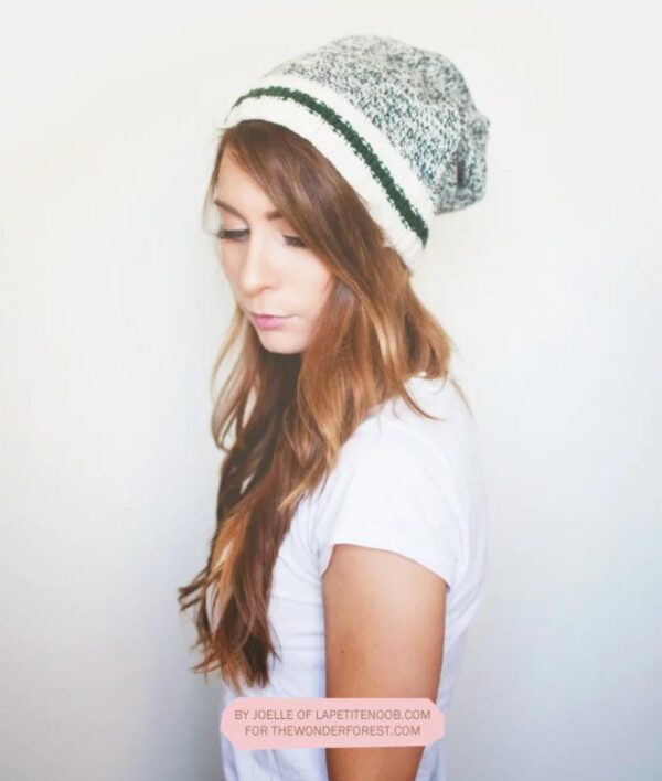 Woman wearing a beanie.