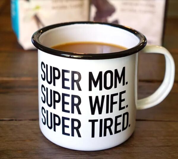 Coffee mug that says super mom, super wife, super tired.