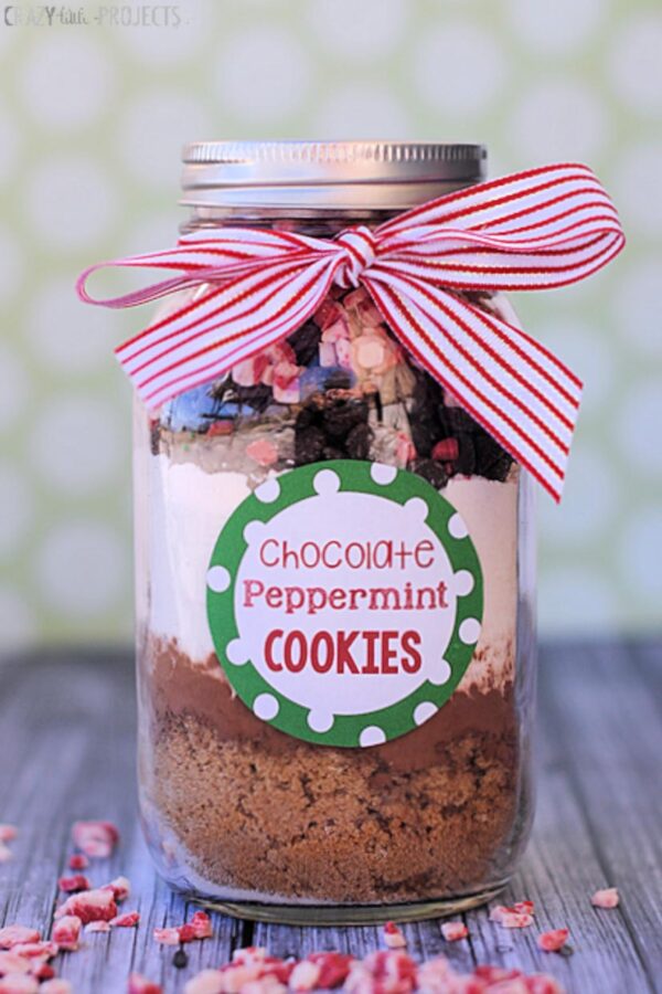 Layered ingredients for peppermint chocolate cookies in a jar.