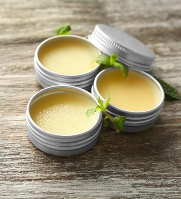 Homemade lip balm in tins.