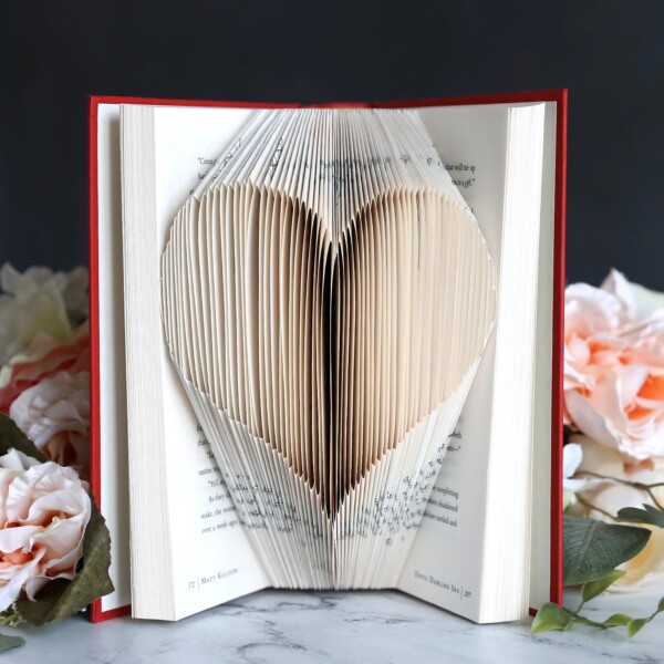 book folded in the shape of a heart