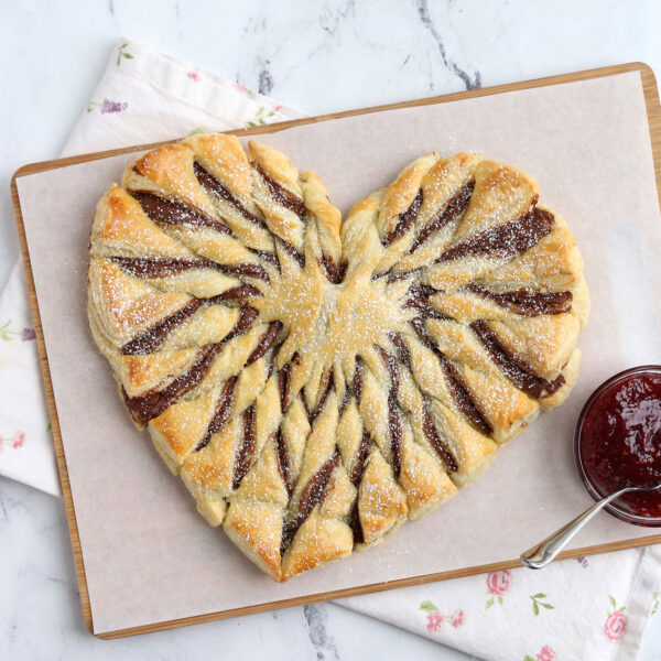 Nutella heart pastry with raspberry jam.