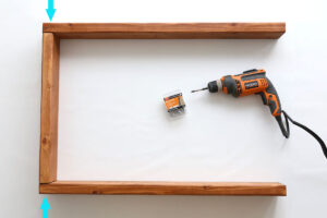 U-shape created with two 34 inch wood pieces and one 21 inch wood piece.