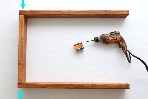 U-shape created with two 34 inch wood pieces and one 21 inch wood piece.