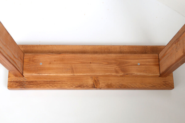 Box attached to base piece.