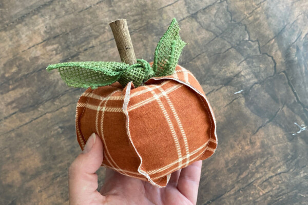 Stem glued into fabric pumpkin