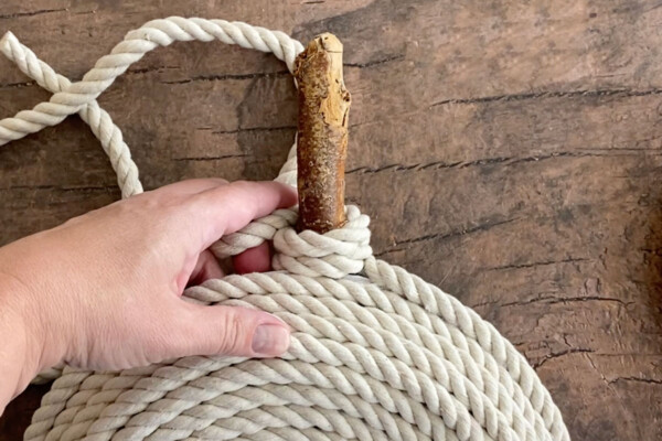 Rope looped around stick twice