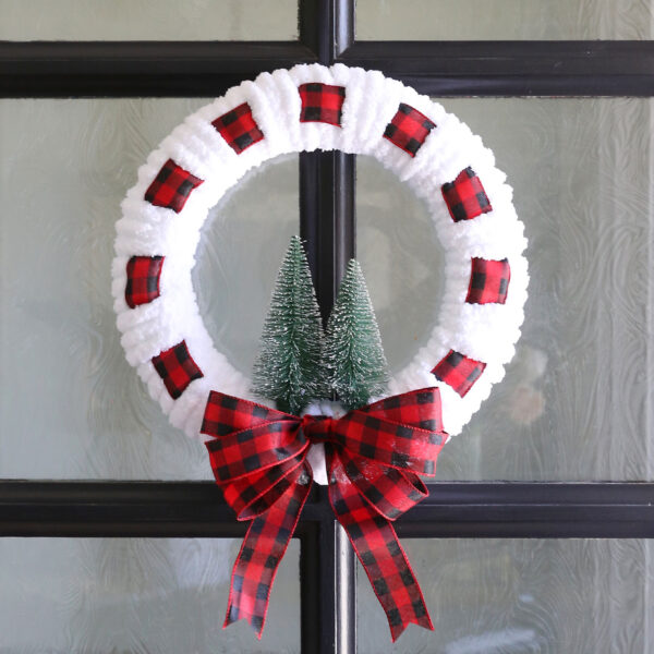 Woven yarn and ribbon Christmas wreath.