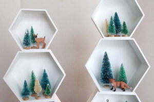 Hexagon shelves with trees and woodland animals.