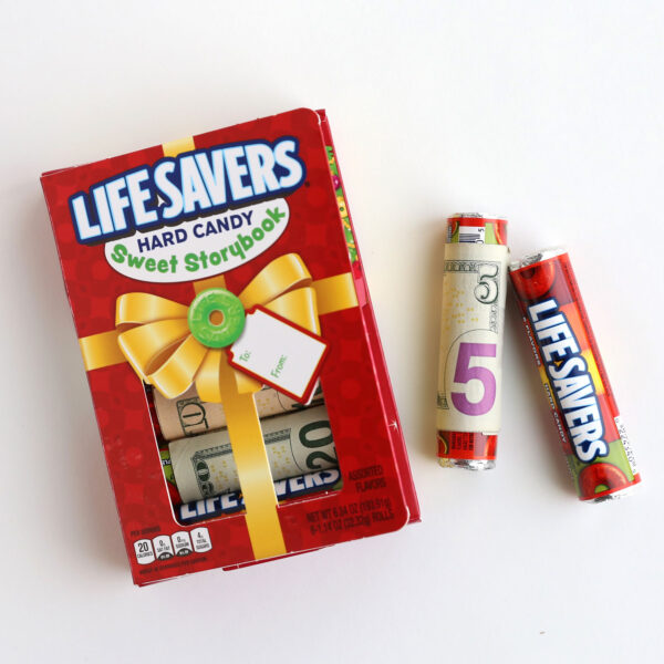 Lifesavers "book" with cash wrapped around lifesaver rolls.