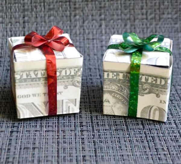 Tiny gift boxes made from money.
