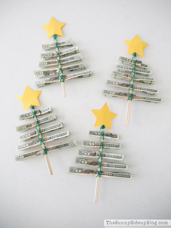 Money folded into Christmas trees.