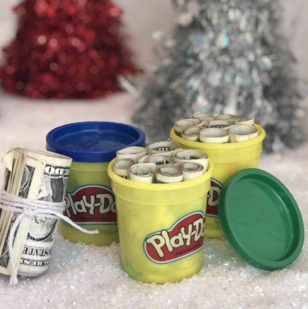 Money inside play doh containers.