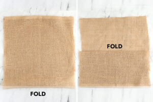 Piece of burlap folded in half; top piece folded down to create pocket.