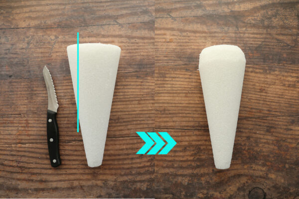 Foam cone cut into carrot shape.