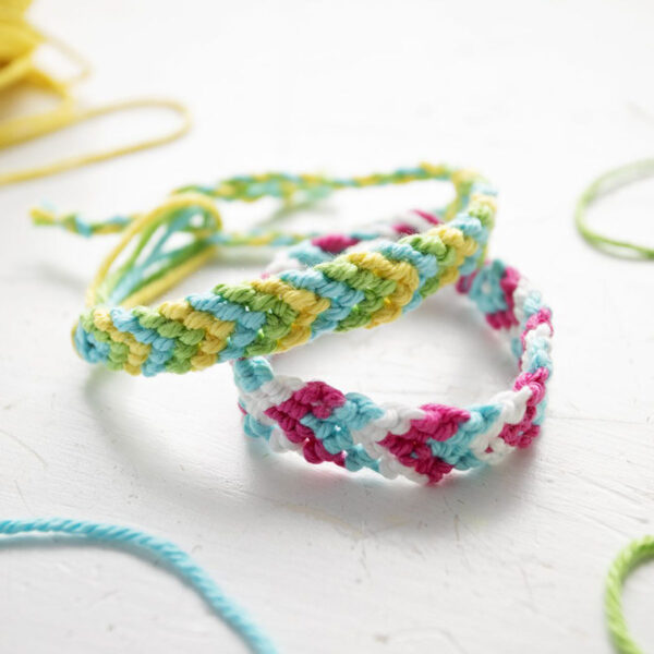 Friendship bracelets with a chevron pattern.