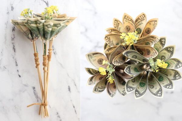 Three money flowers connected together with a pipe cleaner.
