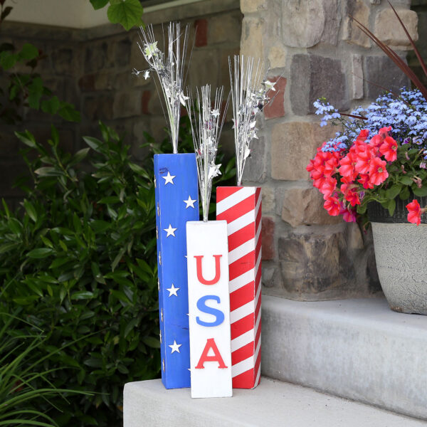 Wooden firecracker porch decorations.