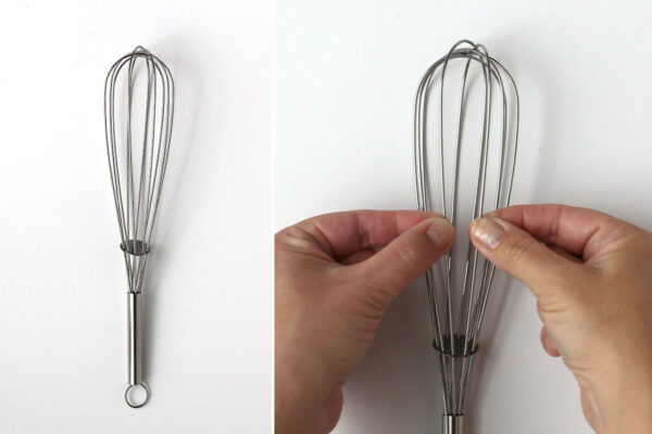 Grabbing the top two loops of the whisk.