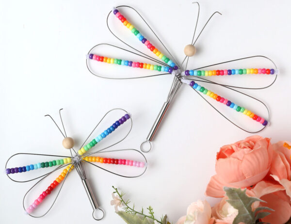 Dragonflies made from metal whisks.