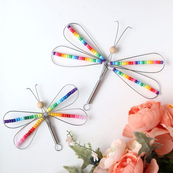 Dragonflies made from metal whisks.