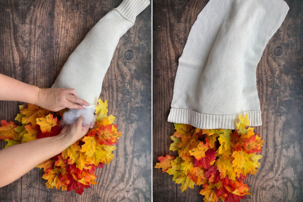 Adding stuffing inside the sleeves to plump up the hat; larger sweater piece laid over hat frame.