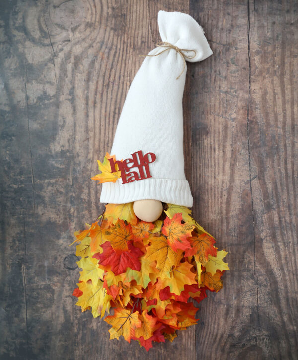 Finished fall gnome wreath with wood words glued onto hat.